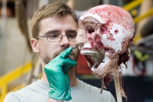 Eric Hart coats the skull with Dragon Skin