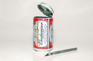 top-cut Cutting the top off of a can