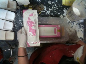 Pouring the plaster into the mold