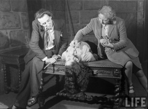 Eva Berkson applies blood to an actress' neck before a scene from "The Hussy". Photograph by Hans Wild, 1947