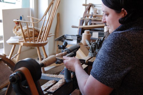 Natalie on a human-powered lathe