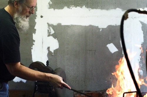 Dick tends the fire Dick tends the fire