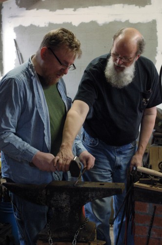 Dick teaches Ben proper hammer technique