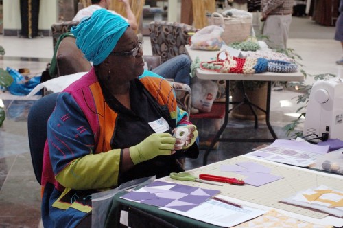 Meltonia Young making Underground Railroad quilts