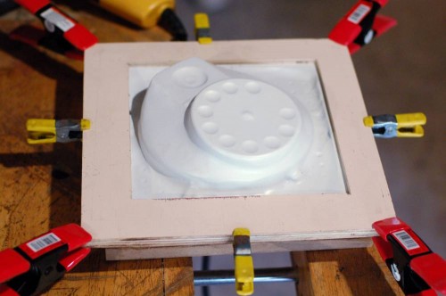Vacuum forming one of the telephone bases